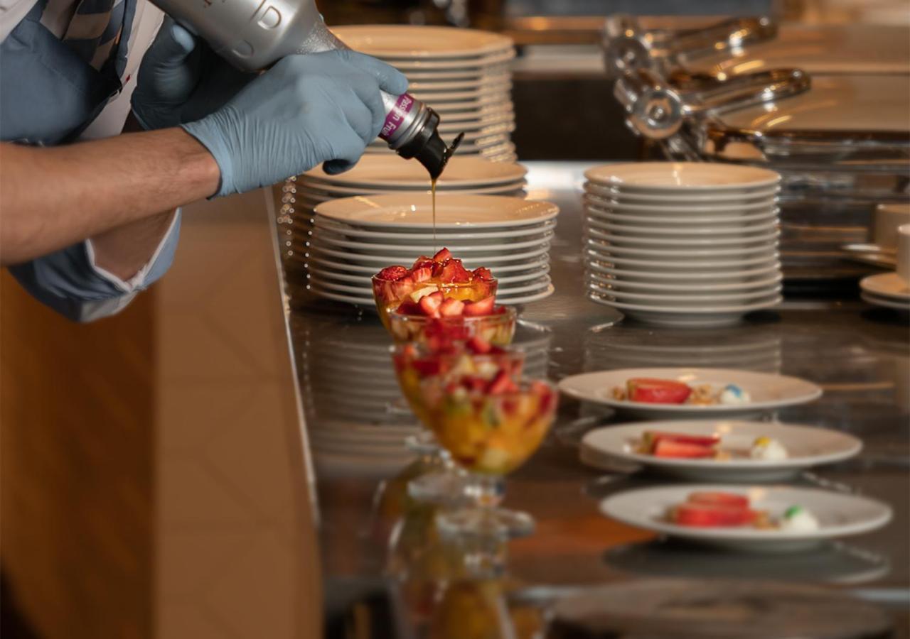 Crystal Inn Hotel - Alamein (Adults Only) El Alamein Ngoại thất bức ảnh A pastry chef finishing a dessert